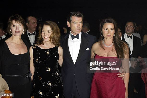 British actor Pierce Brosnan, his wife and Lois Maxwell attend the world premiere party for the film "Die Another Day" at the Bond Marquee Albert...