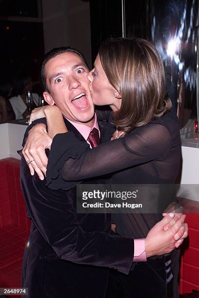 Italian jockey Frankie Dettori and his wife attend the party for the film "Mean Machine" on December 18, 2001 in London.