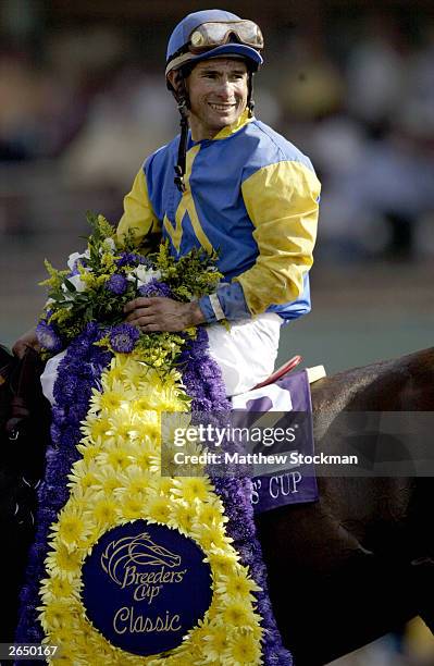 Alex Solis and Pleasantly Perfect wait in the winner's circle after winning the $4 Million Breeders' Cup Classic, Powered by Dodge part of the 2003...