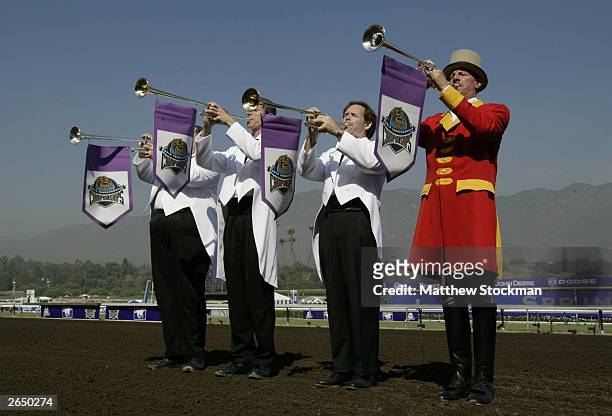 Buglers sound off before the start of the $1 Million Breeders' Cup Classic part of the 2003 Breeders' Cup World Thoroughbred Championships hosted by...