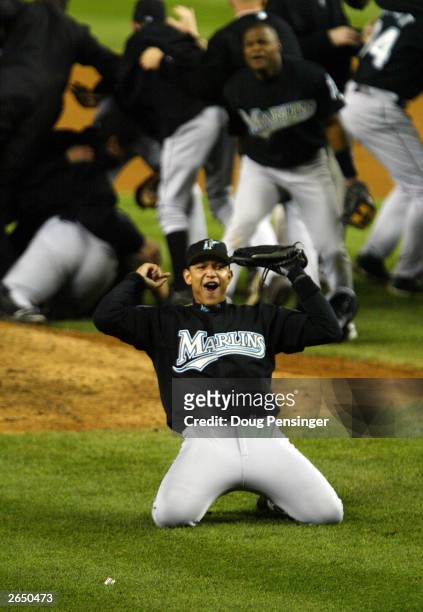 Miguel Cabrera of the Florida Marlins celebrates the Marlins' 2-0 win over the New York Yankees in game six of the Major League Baseball World Series...