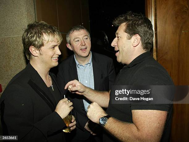 Irish pop star Kian Egan of the pop group "Westlife", Irish music producer Louis Walsh and British DJ "Dr Fox" attend the "Unbreakable" album launch...