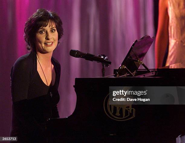 Irish singer Enya performs on stage at the World Music Awards on March 26, 2001 in Monte Carlo, Monaco.