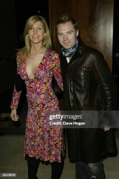 Irish pop star Ronan Keating and his wife attend Westlife's "Unbreakable" album launch at the Zuma Restaurant on November 11, 2002 in London.