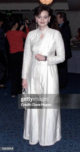 British barrister Cherie Blair collects the award for Kofi Annan at the BT Emma Awards on April 1, 2001 in London.