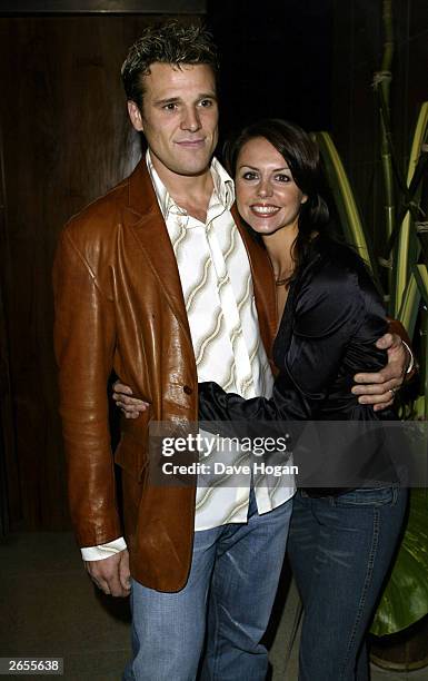 British rower James Cracknell and his partner attend Westlife's "Unbreakable" album launch at the Zuma Restaurant on November 11, 2002 in London.