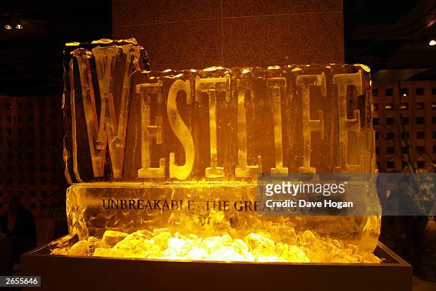 Westlife display at the "Unbreakable" album launch at the Zuma Restaurant on November 11, 2002 in London.