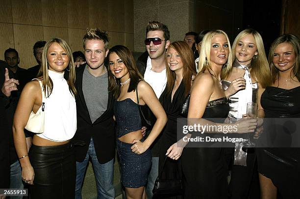 British and Irish pop stars Kimberley Walsh, Nicky Byrne, Cheryl Tweedy, Mark Feehily, Nicola Roberts, Sarah Harding and Nadine Coyle of the pop...