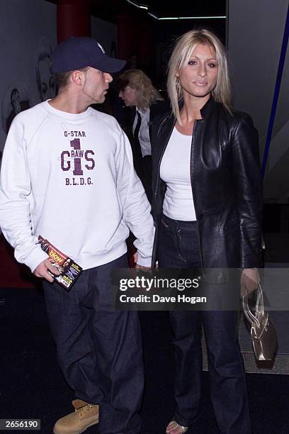 British pop star Jay of the boy band "5ive" and British television presenter Danni Behr arrive at the UK premiere of the film "Blow" at the Warner...