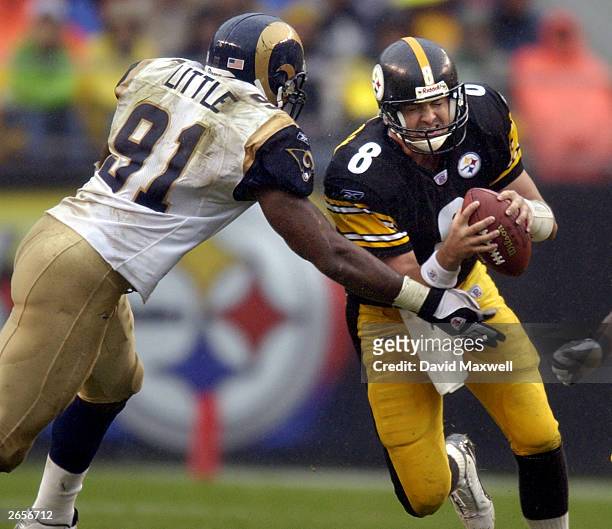 Quarterback Tommy Maddox of the Pittsburgh Steelers about to be sacked by Leonard Little of the St. Louis Rams during the second quarter on October...
