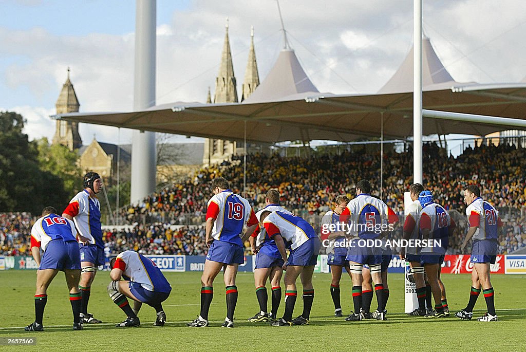 Namibian players look dejected as they a