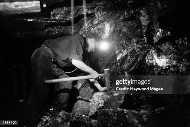 Miner working at the coal face. Original Publication: Picture Post - 8444 - Coal Production - unpub.