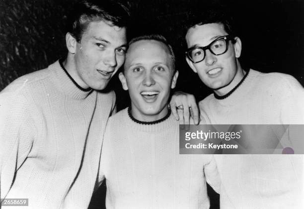 Rock 'n' roll singer, songwriter and guitarist Buddy Holly , right, with his group The Crickets, Jerry Allison and Joe Mauldin.