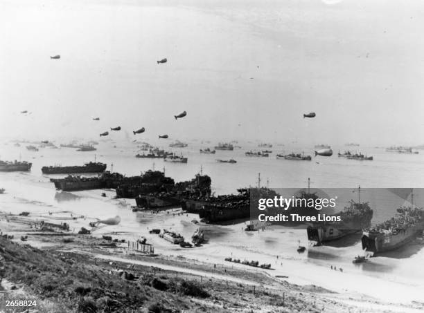 Barrage balloons and shipping at Omaha Beach during the Allied amphibious assault, before the installation of Mulberry Harbour.