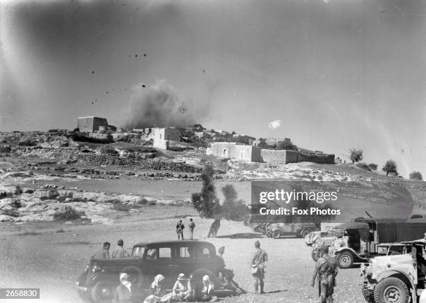 The Arab village of Miar, near Haifa, being blown up during a period of unrest in the British mandate of Palestine. This is a punishment and warning...