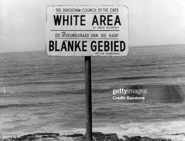 An apartheid notice on a beach near Capetown, denoting the area for whites only.