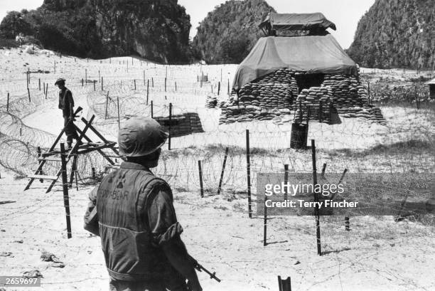 Troops guarding defences near Hui Kinson, Vietnam.