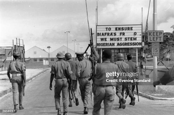 Nigerian troops entering Port Harcourt, after routing Biafran troops during the Biafran War.