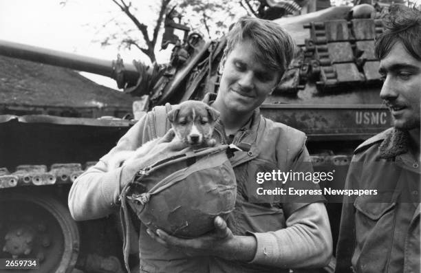 American marines with their pet dog in Vietnam.