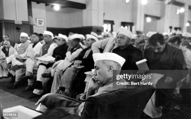 Indian statesman Jawaharial Nehru attending the Constituent Assembly meeting at the Council House Library, New Delhi, to frame a constitution for...