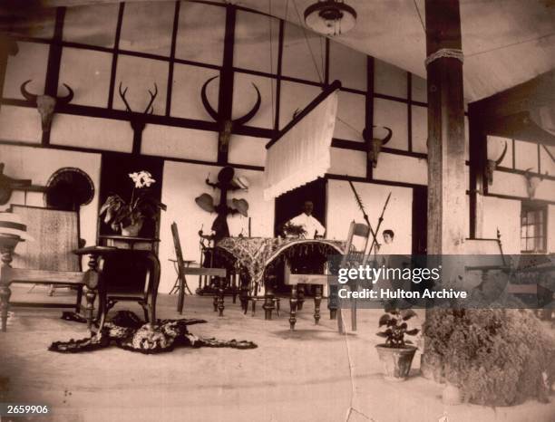 The trophy room of a colonial house in India during the British Raj.