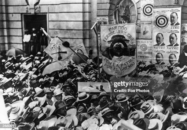 Crowd greet the former President Obregon of Mexico as he arrives in Mexico City. He was re-elected in 1928 and assassinated a few weeks later.