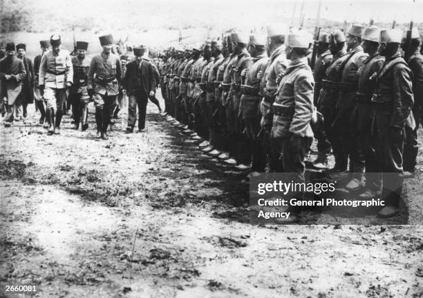 Turkish general and statesman Mustafa Kemal Ataturk reviewing his troops during the war of independence against Greece.