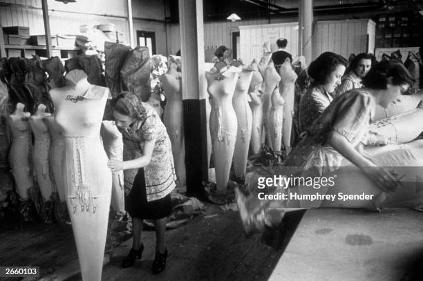 Women working on mannequins at the Twifit Corset Factory, Portsmouth. Original Publication: Picture Post - 202 - Portsmouth - pub. 1939