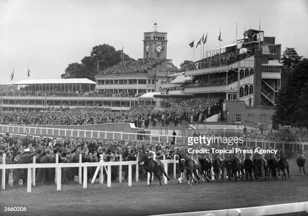 General view of the Ascot raceground with a race in progress.