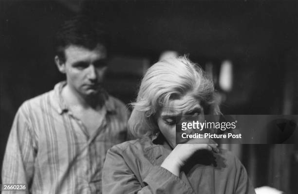 Kenneth Haigh and Mary Ure in the final scene of 'Look Back in Anger' at the Royal Court Theatre, London. Original Publication: Picture Post - 8428 -...