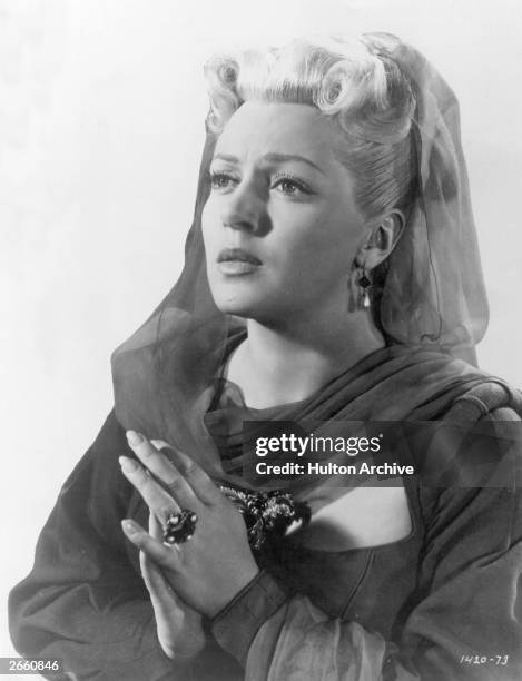 American actress Lana Turner , formerly Julia Turner playing the role of a distressed maiden in the film 'Diane'.