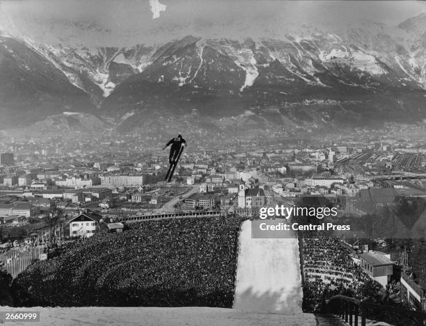 Spectators watching the ski-jump event at the Winter Olympic Games in Innsbruck.