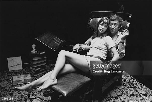 English actress Jane Birkin and French singer-songwriter Serge Gainsbourg, at home in Paris.