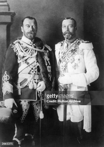 Tsar Nicholas II of Russia with King George V of England , both in full military regalia.