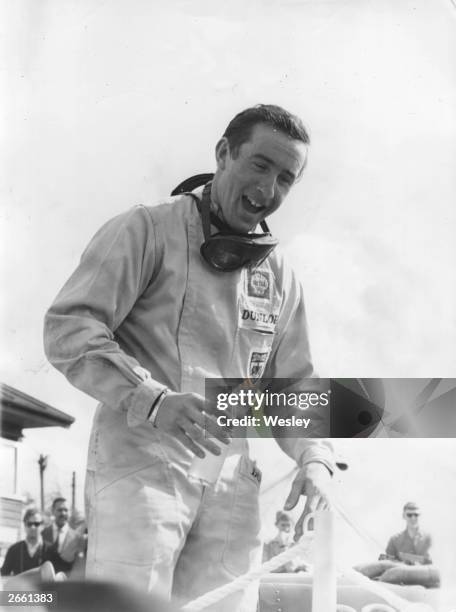 Scottish racing driver Jackie Stewart at Silverstone, after winning an international trophy for third place in the 1965 World Championships. Stewart,...