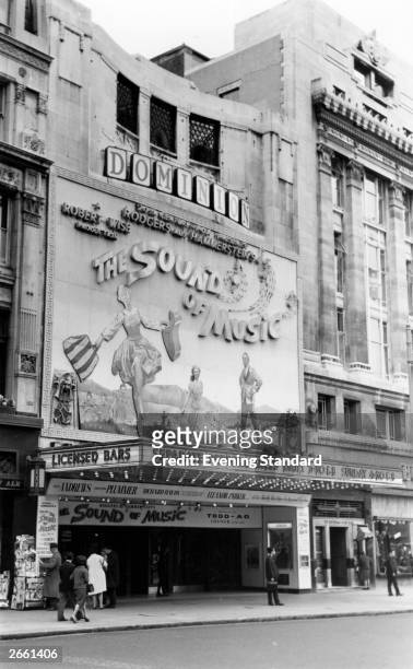 The exterior of London's Dominion Theatre, advertising the film 'The Sound of Music'.