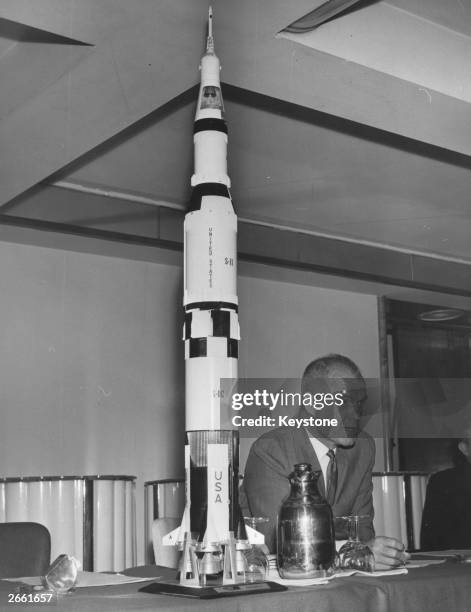 Colonel John Glenn, the first American astronaut to orbit the earth, at a news conference in London.