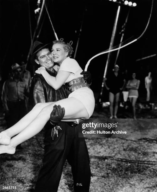 Charlton Heston stars with Betty Hutton in the epic circus drama 'The Greatest Show On Earth', directed by Cecil B DeMille.