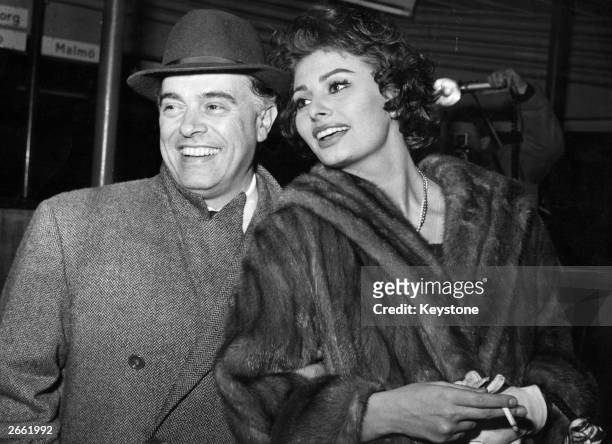 Carlo Ponti, the Italian film director and his wife Sophia Loren, the film actress arriving in Copenhagen en route from Rome to Los Angeles.They...