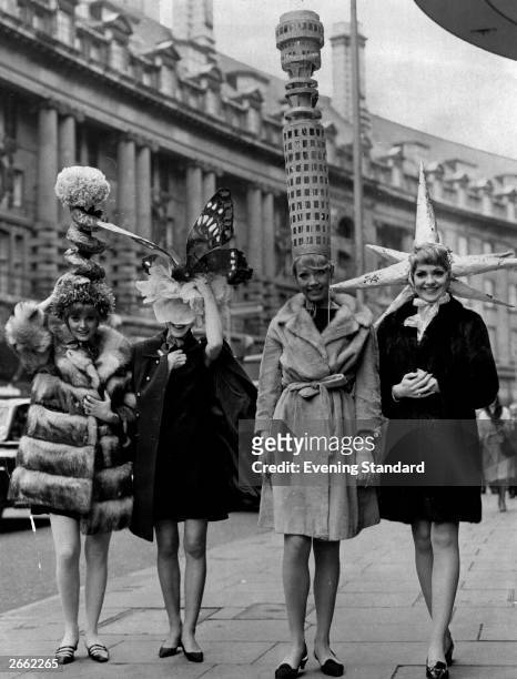 Models Sue Davis , Mary Jane , Sue Burgess and Ingrid Hepner posing for the camera during a 'Hatter's Tea Party', organised by the Millinery...