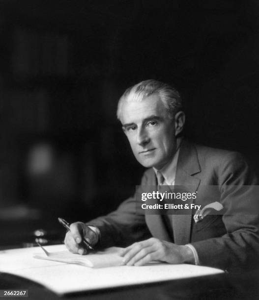 French composer, Maurice Ravel at work on a composition, 1928.