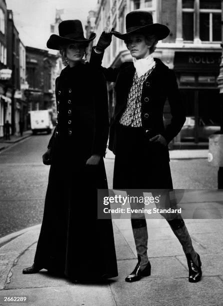 Two models wearing mini and maxi outfits by Christian Dior.