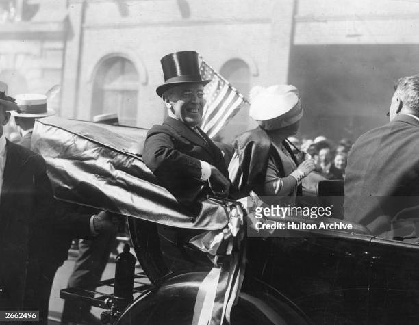 President Woodrow Wilson with the First Lady, Edith Wilson riding in a carriage in New York. President Wilson was the 28th President of the United...