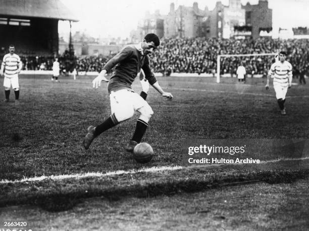 Billy Meredith of Manchester United in action during the first ever FA Charity Shield match against Queens Park Rangers. Following a 1-1 draw, United...