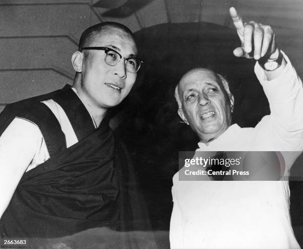 Tibetan spiritual leader the Dalai Lama and Indian Prime Minister Jawaharlal Nehru in New Delhi where they are meeting to discuss the rehabilitation...