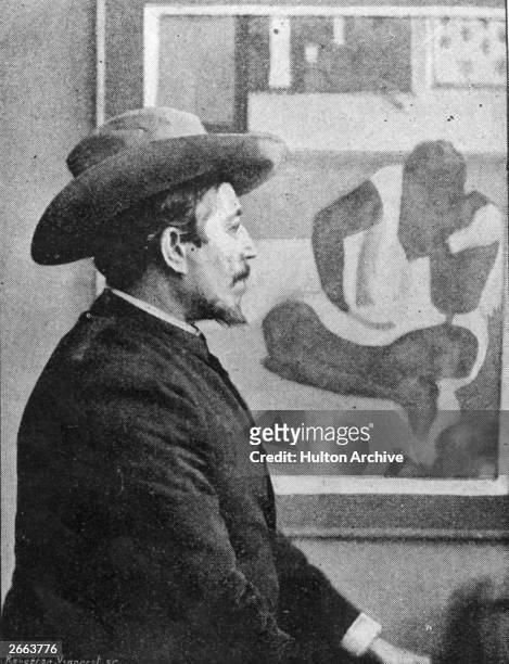 French painter Paul Gauguin seated in front of one of his paintings. Original Publication: People Disc - HD0269