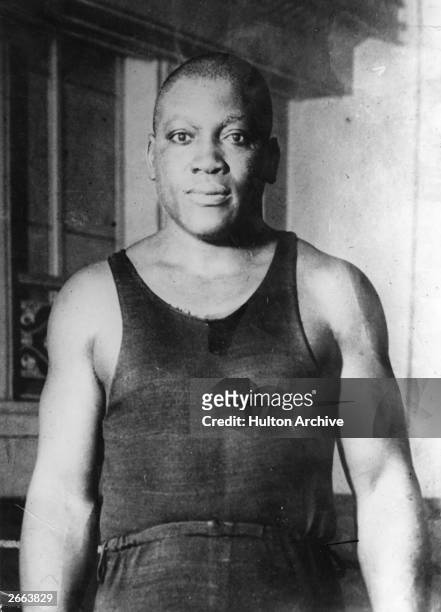Jack Johnson of the USA, one of the greatest yet most unpopular Heavyweight boxers of all time. In 1908 he took the world title from Tommy Burns and...