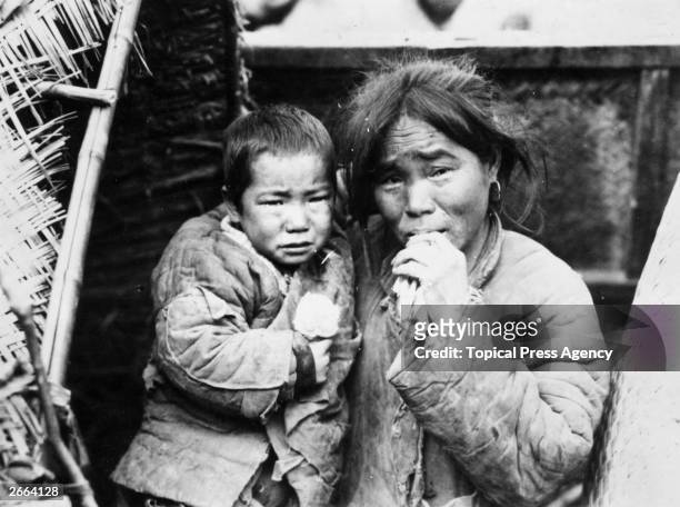 Mother and child, refugees from Shantung during the famine in China.