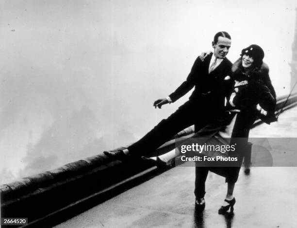 American actor Fred Astaire , dancing on the roof of the Savoy Hotel in London with his sister and dancing partner Adele .