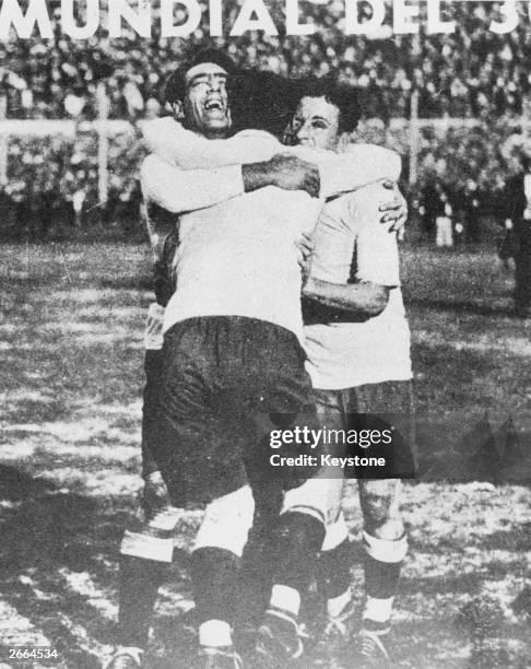 Footballers Lorenzo Fernandez, Pedro Cea and Hector Scarone of the Uruguay national team celebrating winning the first World Cup competition at...